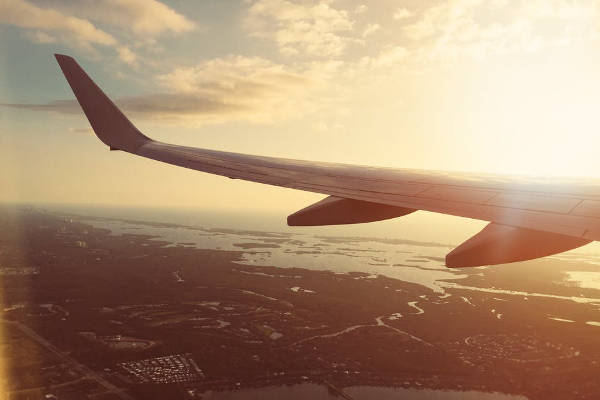 airplane wing - photo credit: https://www.pexels.com/photo/flight-flying-plane-air-travel-59519/